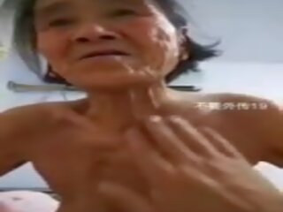 中国の おばあちゃん: 中国の モバイル 大人 クリップ クリップ 図7b